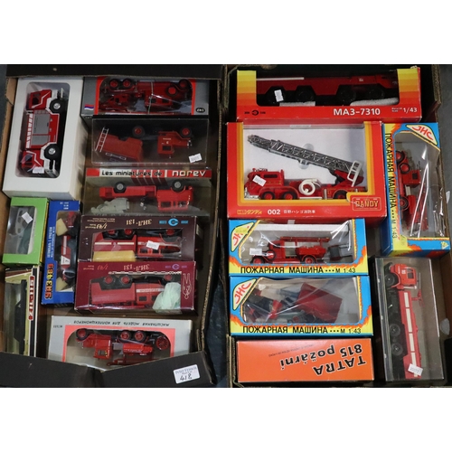 418 - Two boxes of diecast model Fire Engines and Fire related vehicles to include: Japanese, Continental ... 