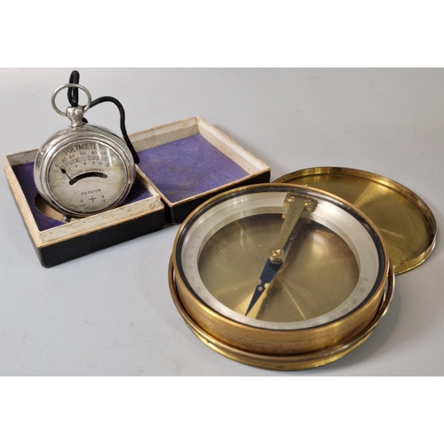 42 - Continental vintage Volt Pocket Meter in original box, together with a 19th century brass Miner's co... 