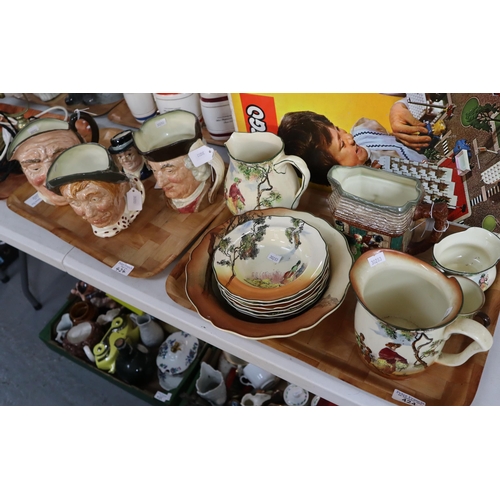 424 - Two trays of Royal Doulton items to include: various Character Jugs including 'Mr Pickwick' together... 