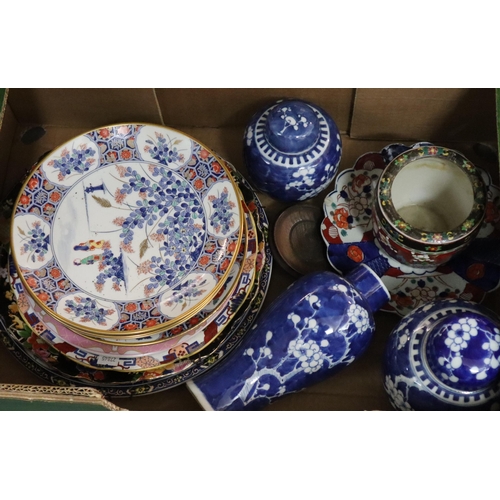 433 - Box of Oriental china and pottery to include: blue and white lidded ginger jars decorated with cherr... 