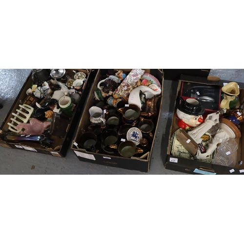 437 - Three boxes of china, glass and metalware to include: copper lustre dresser jugs, figurines, toby an... 