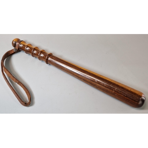 45 - Turned wooden Police Man's truncheon with leather strap.  (B.P. 21% + VAT)