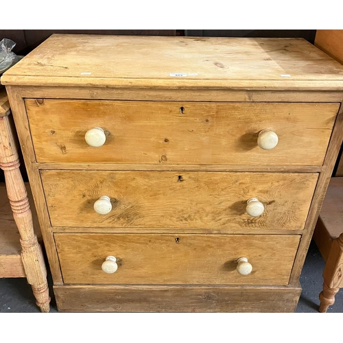 489 - Victorian pine straight front chest of three drawers with turned handles on a platform base. 79x43x8... 