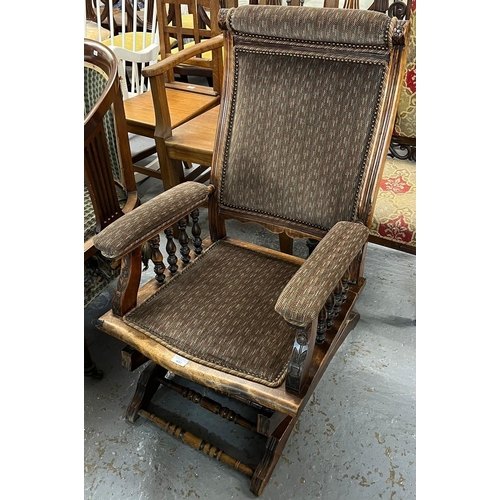 497 - Early 20th century stained American style spring rocking upholstered armchair. (B.P. 21% + VAT)