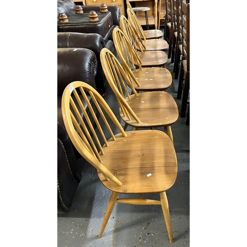 507 - Set of six Ercol Windsor elm and beech spindle and hoop back kitchen chairs. Impressed marks to the ... 