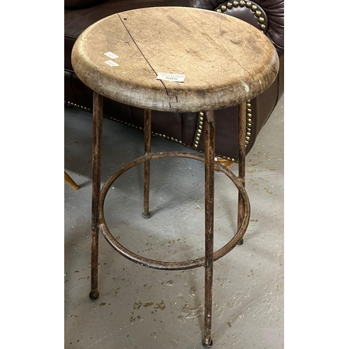 509 - Early 20th century industrial factory stool on tubular metal supports. (B.P. 21% + VAT)