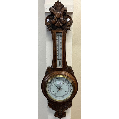 515 - 20th century carved oak aneroid barometer. (B.P. 21% + VAT)