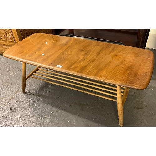 533 - Elm Ercol coffee table with under-tier. (B.P. 21% + VAT)