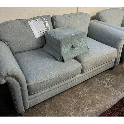 540 - Modern mint green upholstered two seater sofa and matching armchair. Purchased at DFS. Together with... 