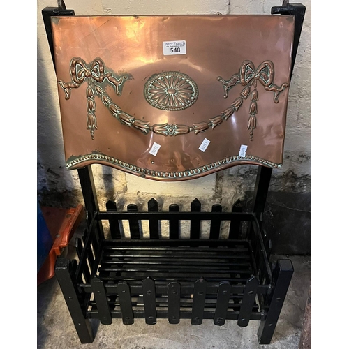 548 - Early 20th century wrought iron dog grate with Adam's style copper repousse canopy. (B.P. 21% + VAT)