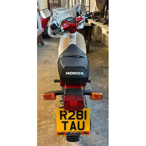 555 - MOTORCYCLE to be sold at 12 Noon precisely.
1997 Honda C90 Cub 'Step through' motorcycle, Reg No R28... 