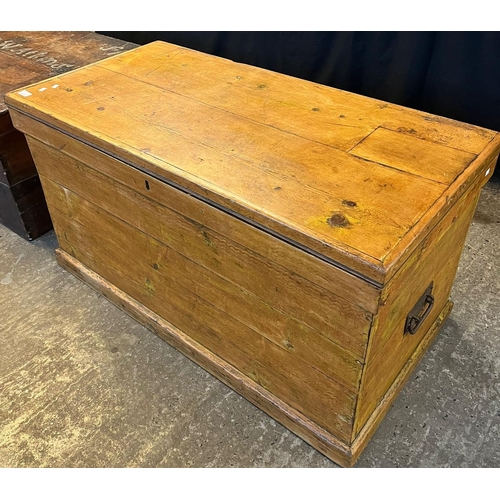 559 - 19th century pine trunk with iron carrying handles. 110cm wide x 55cm deep x 60cm high approx. (B.P.... 