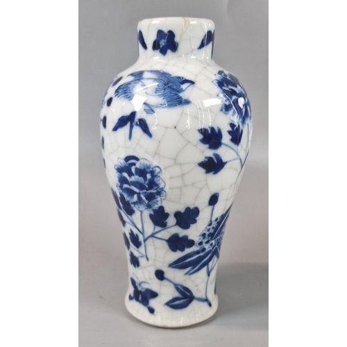 57 - Chinese porcelain crackle glaze blue and white baluster vase and cover, decorated with birds and fol... 