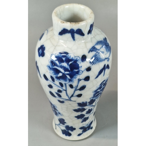 57 - Chinese porcelain crackle glaze blue and white baluster vase and cover, decorated with birds and fol... 