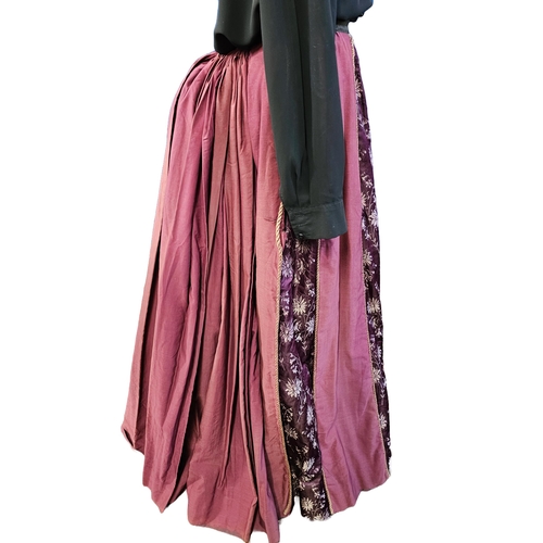 588 - Victorian maroon bustle cotton skirt with floral patterned panels to the centre, front and sides, ga... 