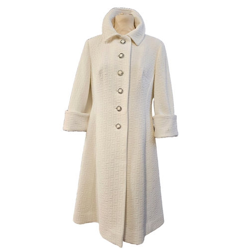 589 - 1960s/70s 'Eastex' labelled synthetic white coat, flared turn back sleeves with decorative pattern a... 