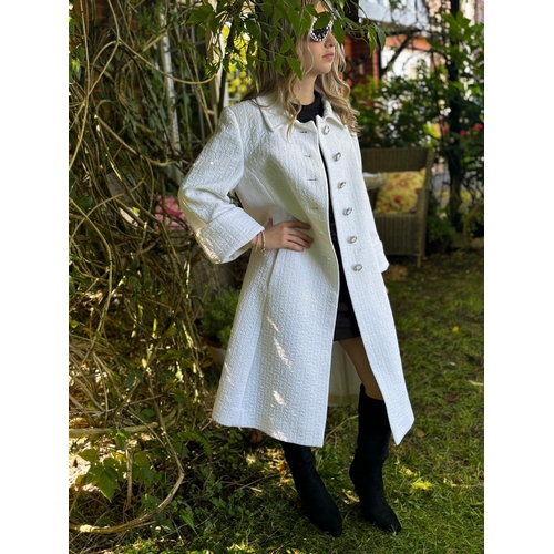 589 - 1960s/70s 'Eastex' labelled synthetic white coat, flared turn back sleeves with decorative pattern a... 