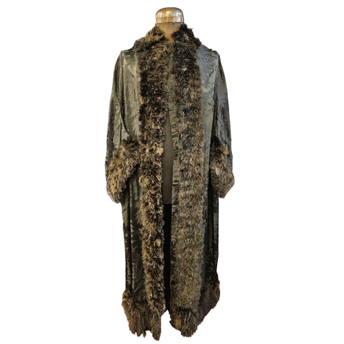 590 - Victorian full length black damask coat with feathered trim, broad low set sleeves and inverted plea... 