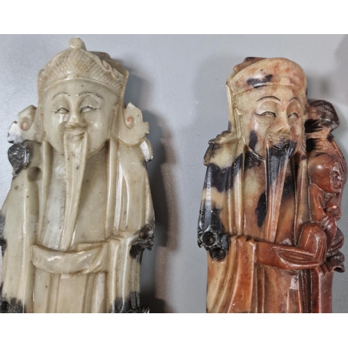 65 - Chinese carved soap stone Immortal figures on stand. (B.P. 21% + VAT)