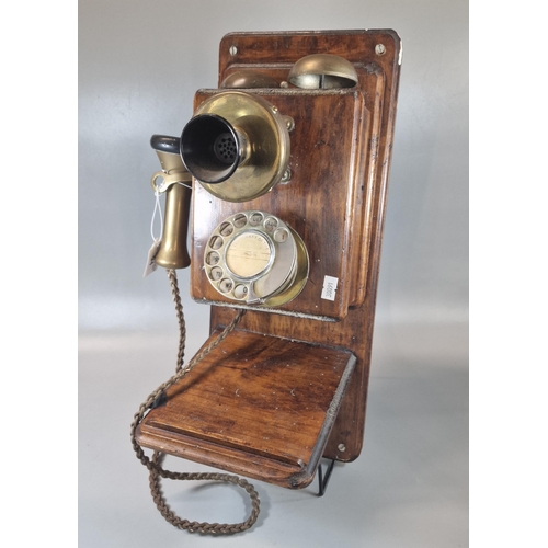 94 - Early 20th century wall mounted telephone with brass bells, brass ear piece and cord flex. (B.P. 21%... 