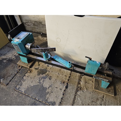 594 - A Myford Mystro II electric bench lathe. (B.P. 21% + VAT)