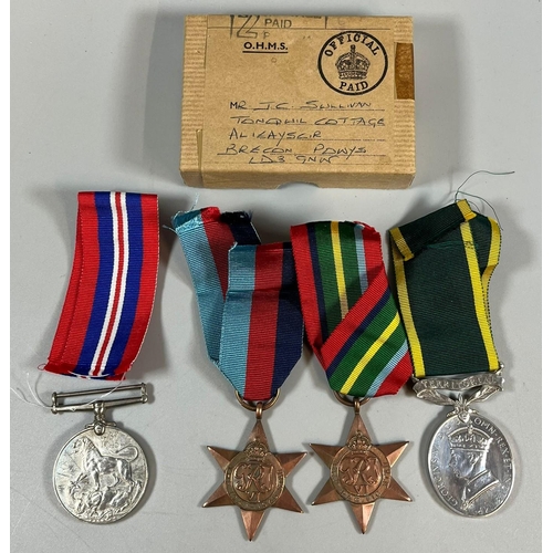 106 - WWII medal group of four comprising: 39-45 Star, Pacific Star, 39-45 War Medal and Territorial Effic... 