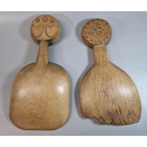 142 - Two similar 19th century Welsh sycamore scoops with double sided butter stamps to the handles of a c... 