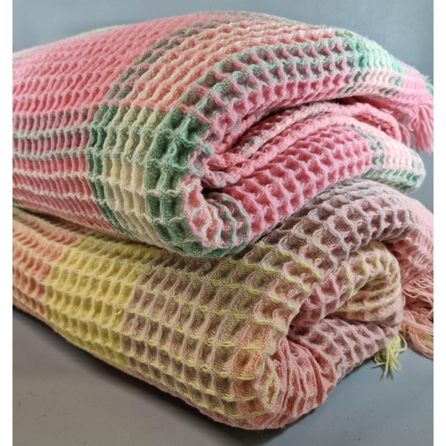 160 - Two similar multi-coloured honeycomb blankets. (2)  (B.P. 21% + VAT)