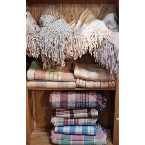 163 - Collection of thirteen Welsh blankets, varying designs including: fringed, checked etc. (13) (B.P. 2... 