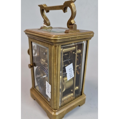 179 - Antique French brass repeating carriage clock with Roman numerals. With key. (B.P. 21% + VAT)