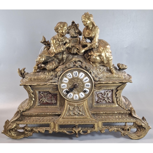 180 - 20th century French style Imperial brass mantel clock, the Roman numeral dial surmounted by two youn... 