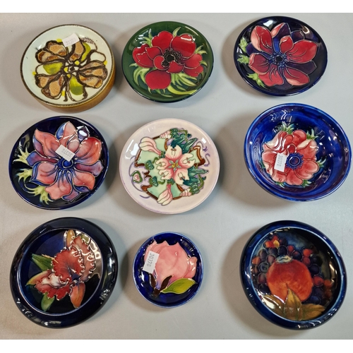 184 - Collection of Moorcroft pottery tube-lined design items in the 'Anemone' and other patterns, mainly ... 