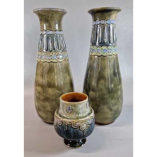 188 - Pair of early 20th century Royal Doulton stoneware vases together with another Doulton stoneware gob... 