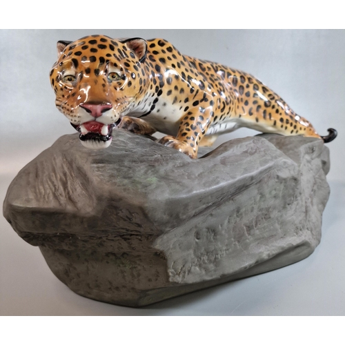 191 - Royal Doulton HN2638 large prestige model of a Leopard on naturalistic rock, marked to the underside... 