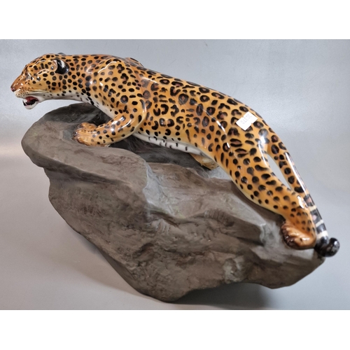 191 - Royal Doulton HN2638 large prestige model of a Leopard on naturalistic rock, marked to the underside... 