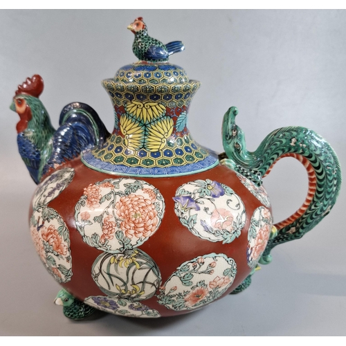 192 - Japanese Satsuma export pottery teapot, overall decorated in polychrome enamels with roundels of flo... 