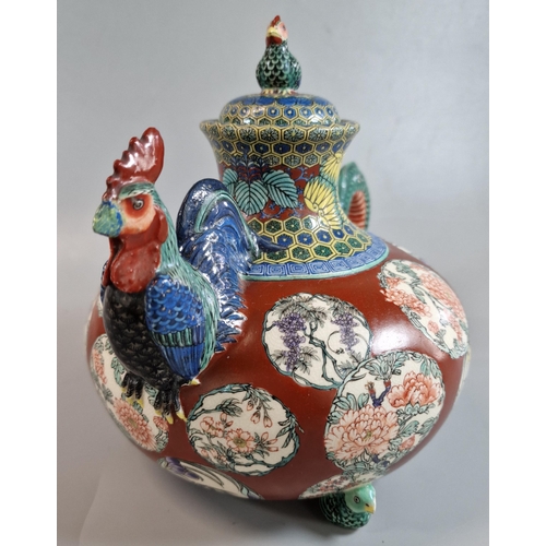 192 - Japanese Satsuma export pottery teapot, overall decorated in polychrome enamels with roundels of flo... 