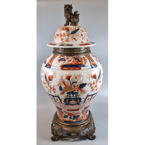 204 - 19th century English pottery 'Imari' style baluster shaped vase and cover, having good quality ormol... 