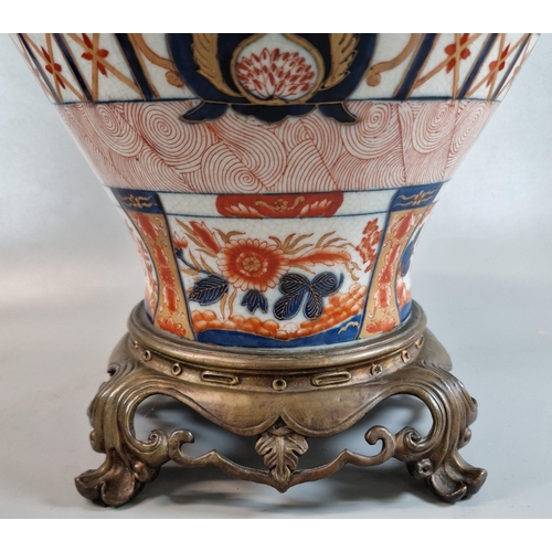 204 - 19th century English pottery 'Imari' style baluster shaped vase and cover, having good quality ormol... 