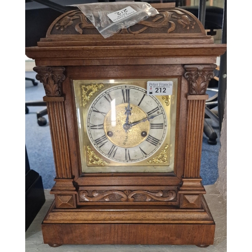 212 - Early 20th century walnut cased two train mantel clock with Art Nouveau decoration. (B.P. 21% + VAT)