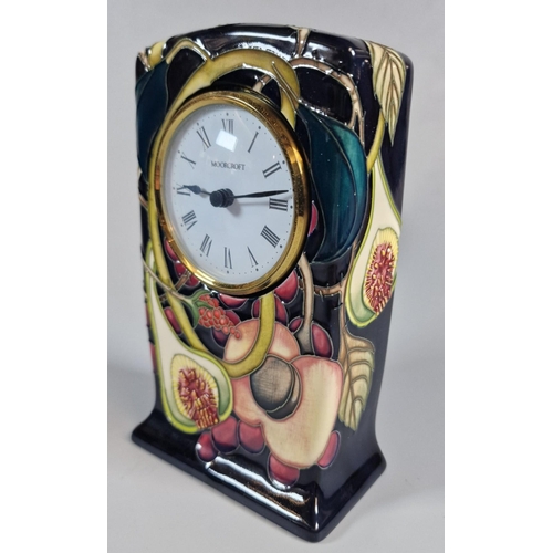 217 - Modern Moorcroft tube-lined Queen's Choice mantel clock dated 2000, in original box. (B.P. 21% + VAT... 