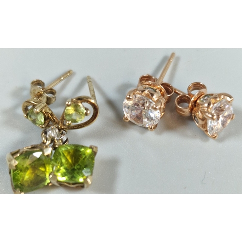 287 - Pair of 14ct gold clear stone earrings. 2.2g approx. together with a pair of 9ct gold green stone ea... 