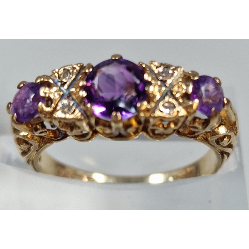 298 - 9ct gold purple stone dress ring with tiny diamond chips. 2.7g approx. Size L1/2. (B.P. 21% + VAT)