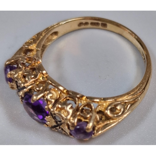 298 - 9ct gold purple stone dress ring with tiny diamond chips. 2.7g approx. Size L1/2. (B.P. 21% + VAT)