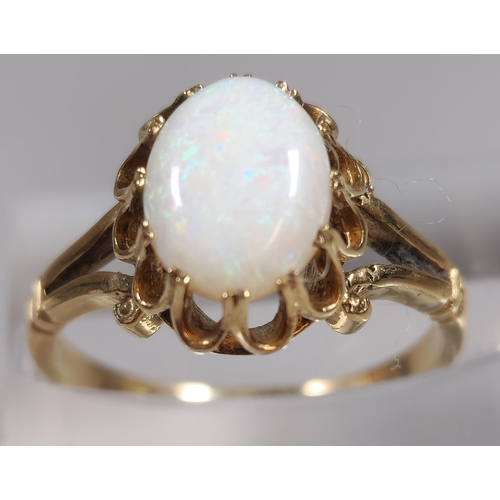 300 - 9ct gold opal dress. 2.4g approx. Size L. (B.P. 21% + VAT)