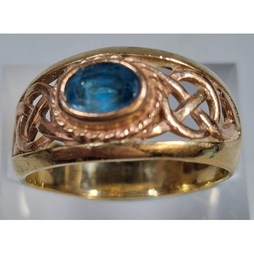 302 - 9ct gold Clogau Celtic design ring set with blue topaz. 5.5g approx. Size Q1/2. (B.P. 21% + VAT)