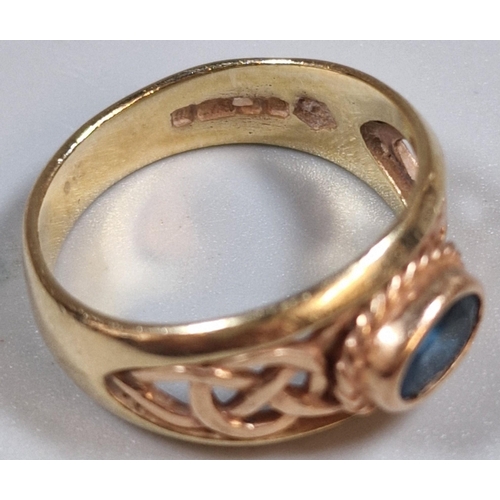 302 - 9ct gold Clogau Celtic design ring set with blue topaz. 5.5g approx. Size Q1/2. (B.P. 21% + VAT)