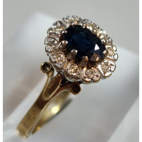 314 - 9ct diamond and sapphire cluster ring. 3g approx. Size M. (B.P. 21% + VAT)