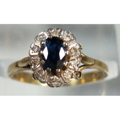 314 - 9ct diamond and sapphire cluster ring. 3g approx. Size M. (B.P. 21% + VAT)