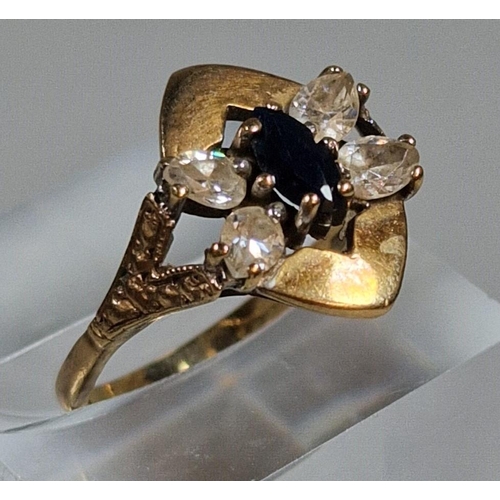 319 - 9ct gold dress ring, the blue and clear stones formed as an insect. 2.7g approx. Size M1/2. (B.P. 21... 